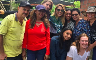 colombia family standing with students