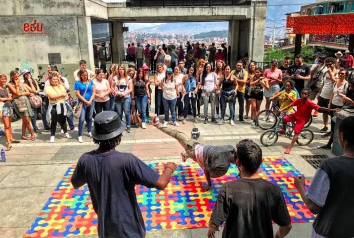 crowd watching breakdancers in medellin