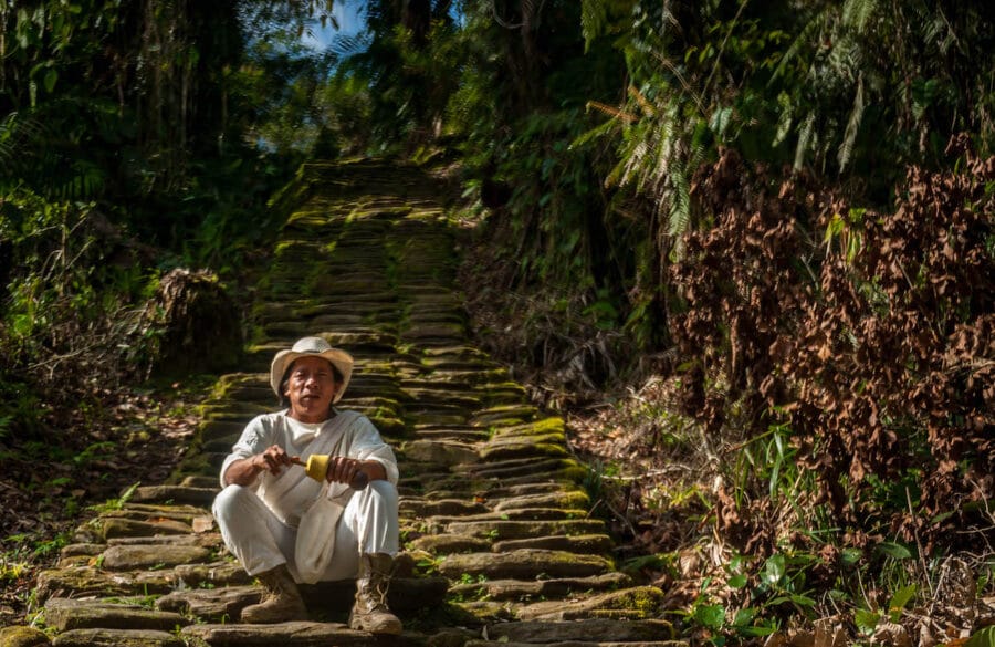 man sitting on steps to lost city e1671632004460