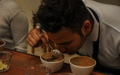 man sniffing colombian coffee